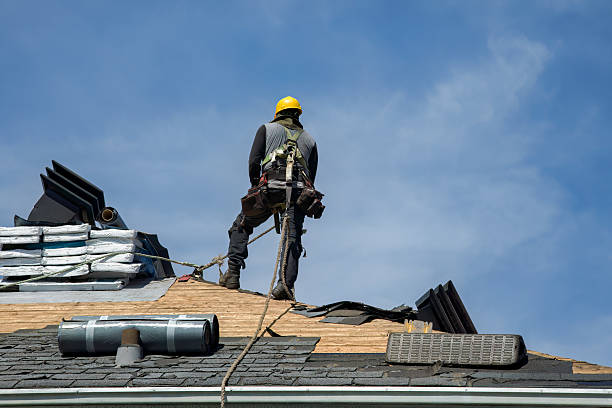 Professional Storm Damage Roof Repair technician working in Clifton, KS